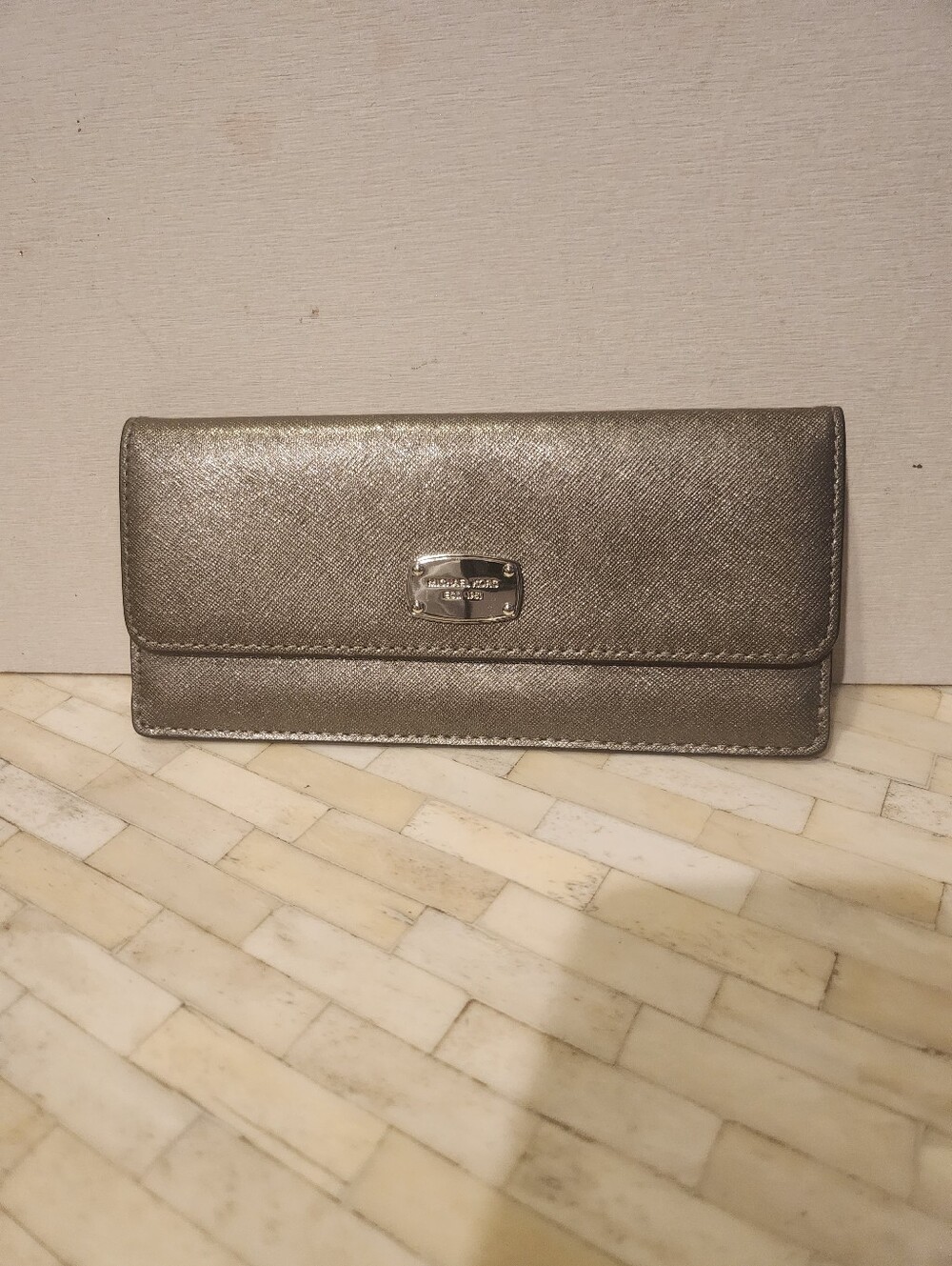 Michael Kors silver Saffiano leather flat wallet
